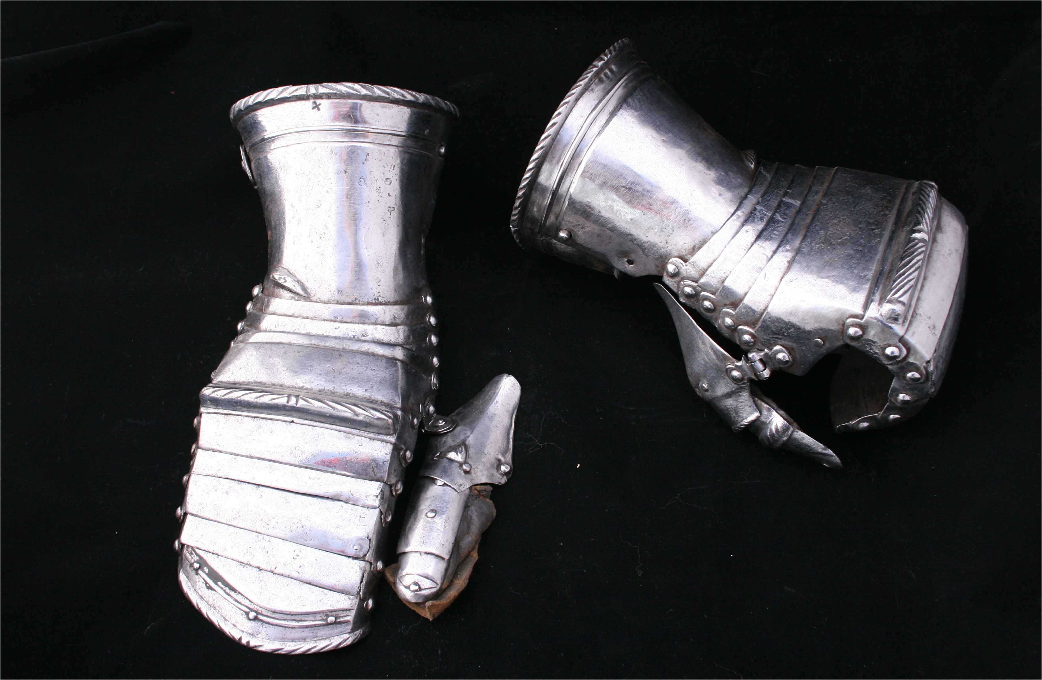 2 Gauntlets - A-104-pair-one-bent