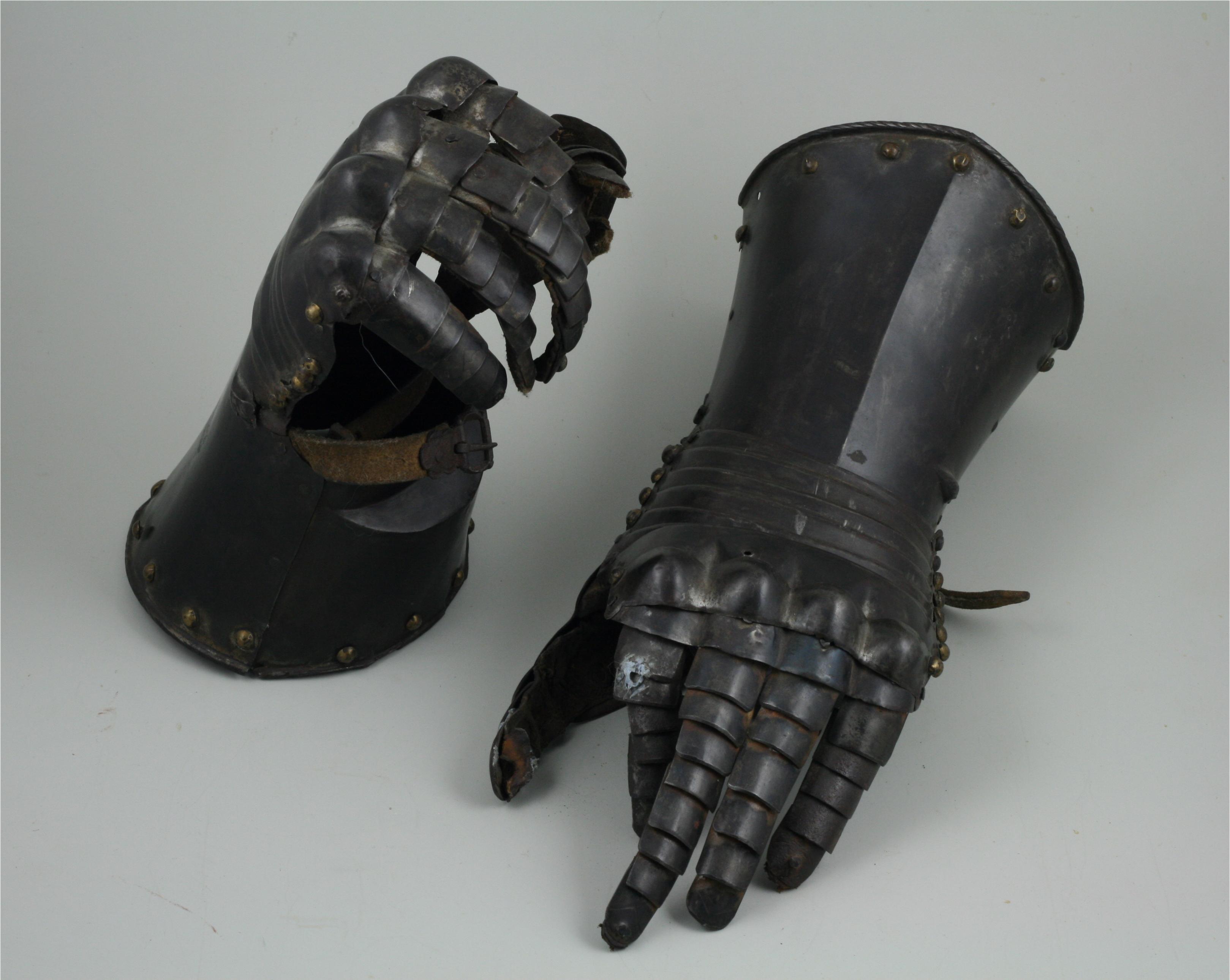 Pair of finger gauntlets. - A-121-OneUpOneDown