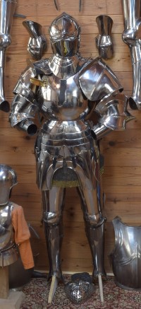 stand for a mid 16th c. black and white armor made for a child