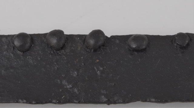 Original 16th c. rivet on armour