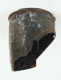 Upper cannon of a vambrace. In excavated condition.