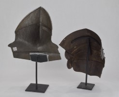 Stands holding a buffe that is normally secured to a breastplate and a kneStands holding a buffe that is normally secured to a breastplate and a knee