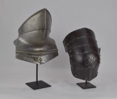 Stands holding a buffe that is normally secured to a breastplate and a kneStands holding a buffe that is normally secured to a breastplate and a knee