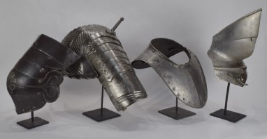 Four different single items on custom stands.